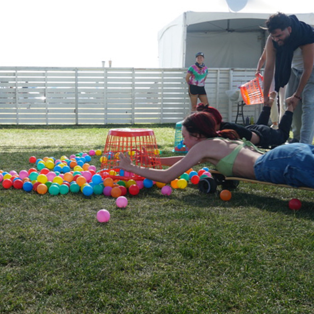 Woman playing game on lawn