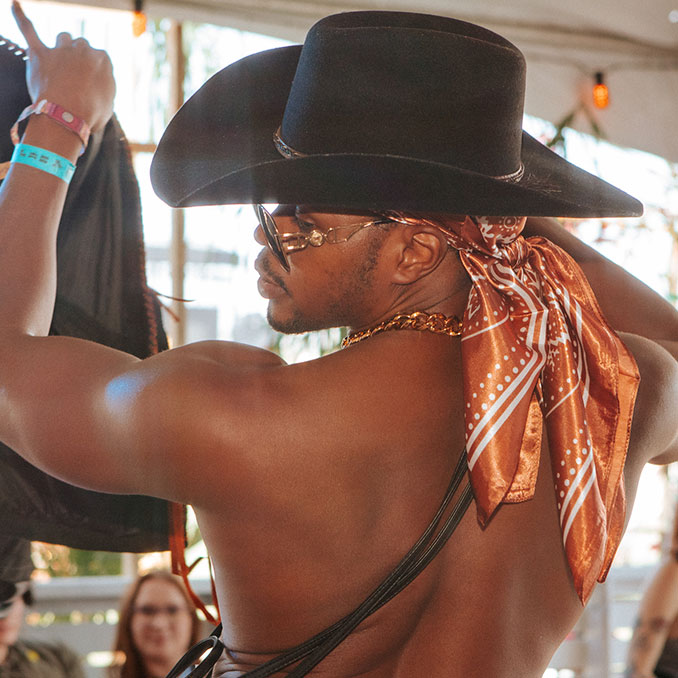Coachella fan in cowboy hat