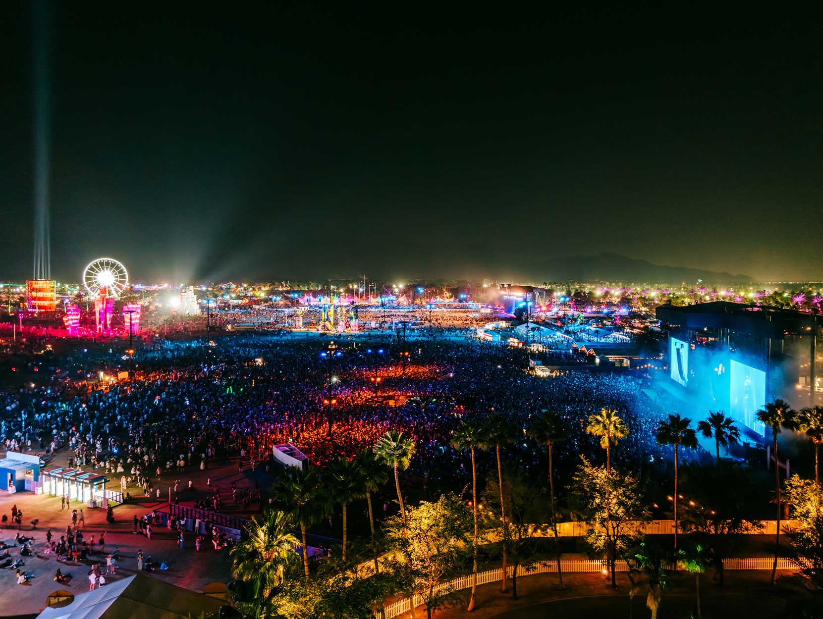 wide shot of Coachella grounds at night