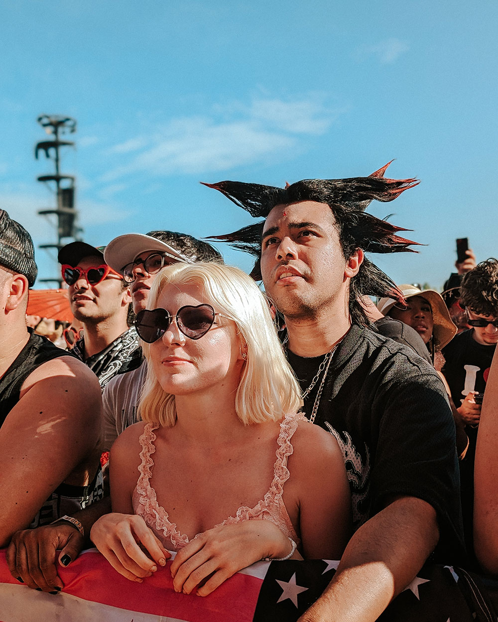 closeup of fans in front of stage