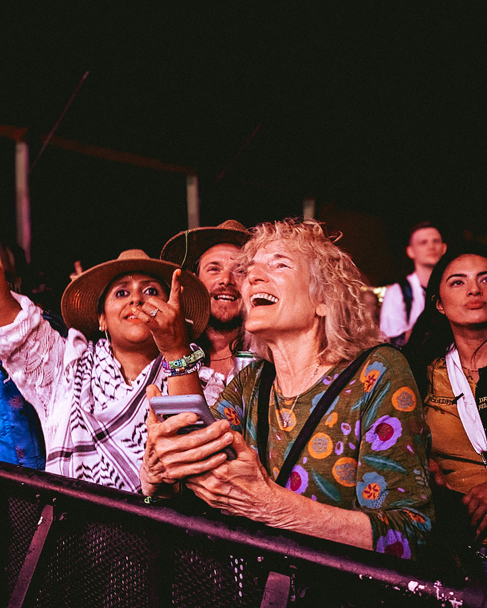 closeup of fans in front of stage