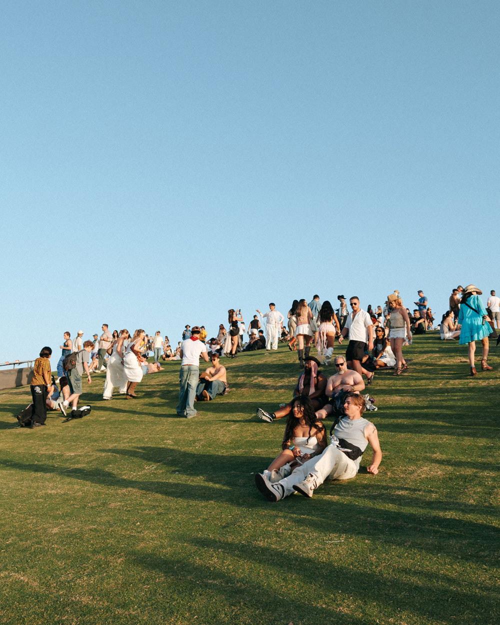 fans sitting on lawn